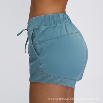 Hot Solid Color Yoga Shorts Lacas femininas respiráveis ​​com bolsos